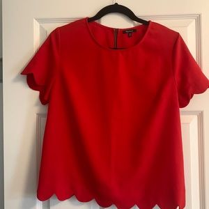 Red scalloped-edged shirt